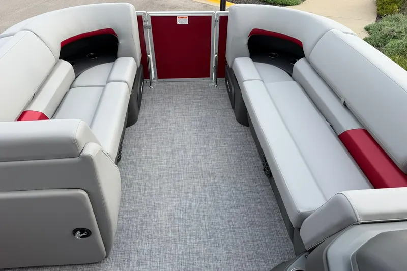 Slide: The Image of 2027 Sun Tracker Party Barge 20 DLX interior with gray and red seating. - 14