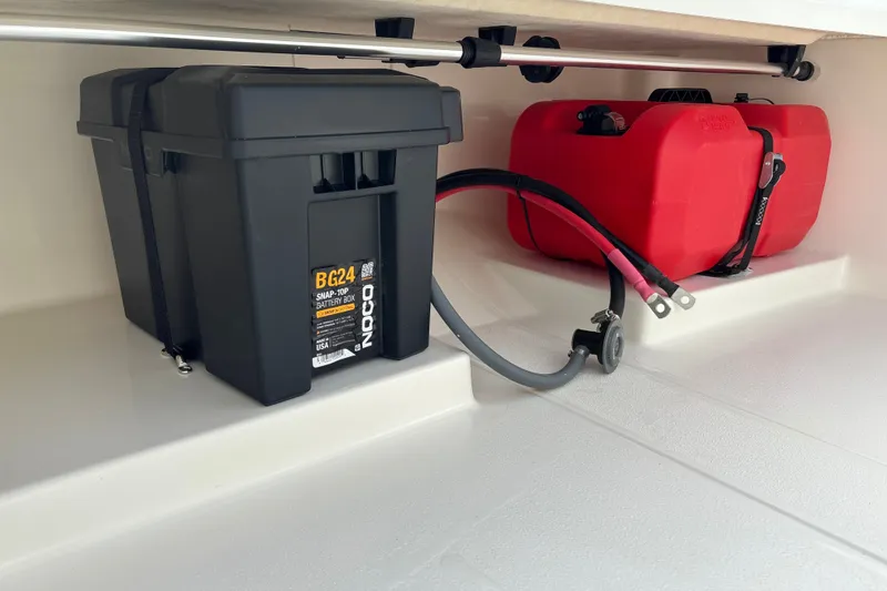 Slide: The Image of Battery and fuel tank setup in 2026 Mako Pro Skiff 13 CC boat. - 19