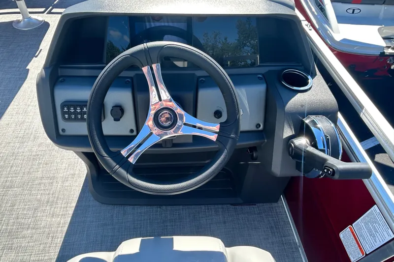 Slide: The Image of Steering console of 2027 Sun Tracker SportFish 20 DLX pontoon boat. - 13