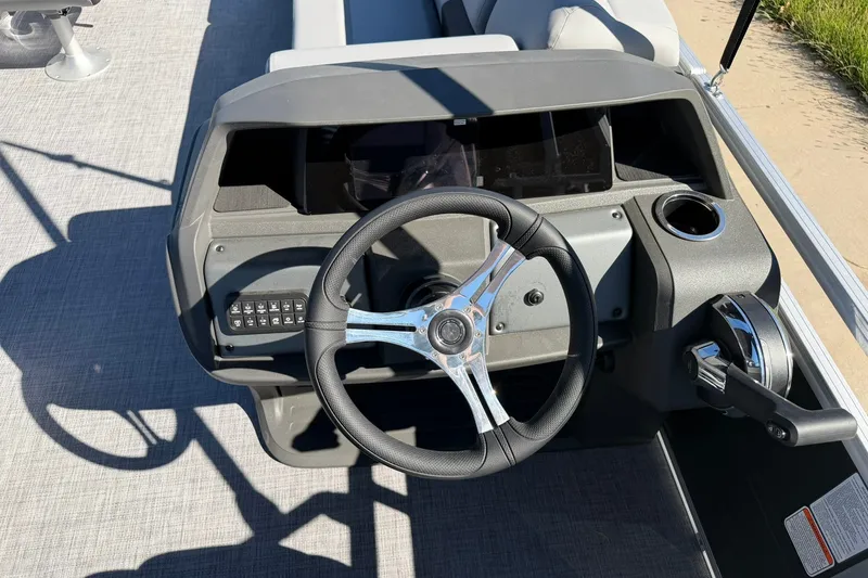 Slide: The Image of Steering console of 2027 Sun Tracker SportFish 20 DLX pontoon boat with modern controls. - 21