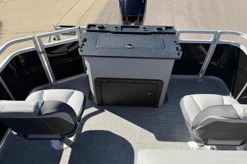 Slide: The Image of 2027 Sun Tracker SportFish 20 DLX boat interior with seating and control panel. - 23