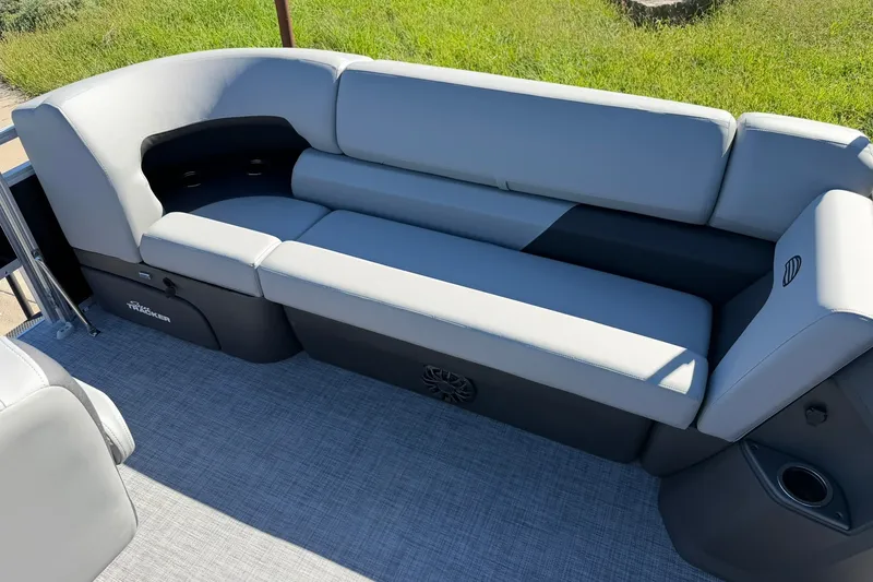 Slide: The Image of 2027 Sun Tracker SportFish 20 DLX boat interior with gray cushioned seating. - 18