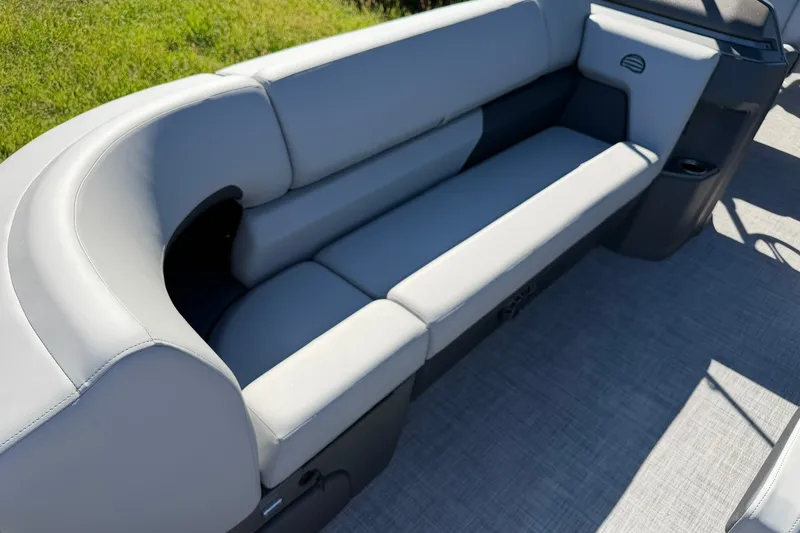 Slide: The Image of Sun Tracker SportFish 20 DLX 2027 boat interior with gray cushioned seating. - 15