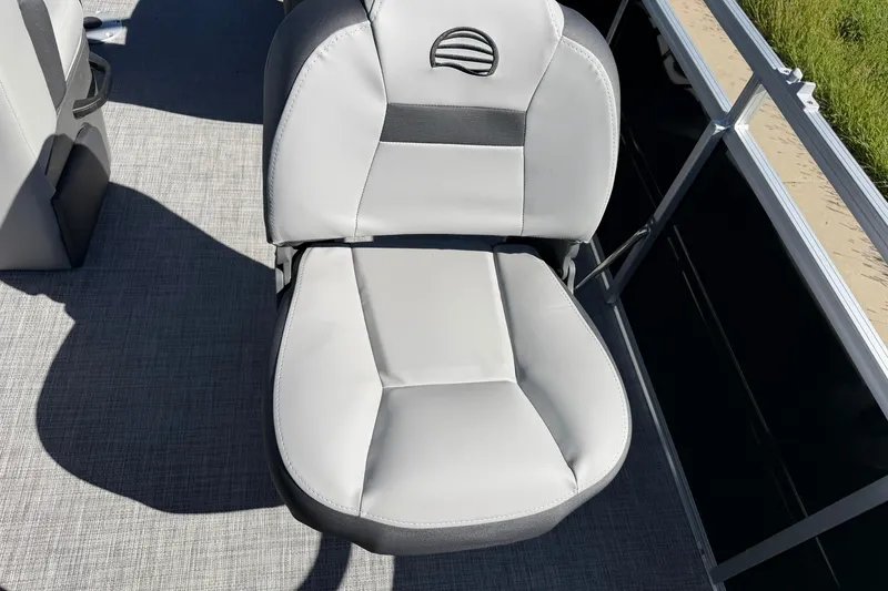 Slide: The Image of Sun Tracker SportFish 20 DLX 2027 boat seat with sleek gray upholstery. - 25