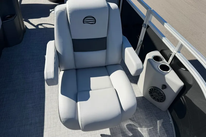 Slide: The Image of Luxurious seating on 2027 Sun Tracker SportFish 20 DLX pontoon boat with cup holders and speaker. - 14