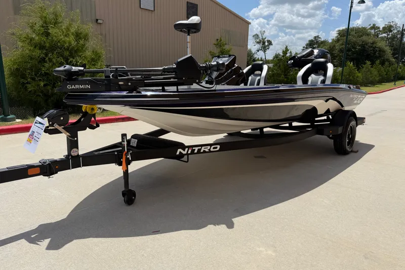 Slide: The Image of 2027 Nitro Z18 XL Pro fishing boat on trailer, featuring Garmin equipment. - 9