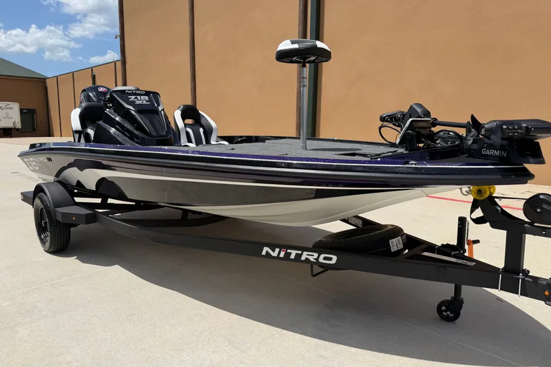 Slide: The Image of 2027 Nitro Z18 XL Pro fishing boat on trailer, featuring Garmin equipment. - 3