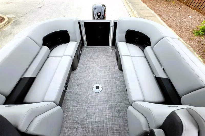 Slide: The Image of 2027 Sun Tracker Party Barge 22 DLX interior with spacious seating and modern design. - 16