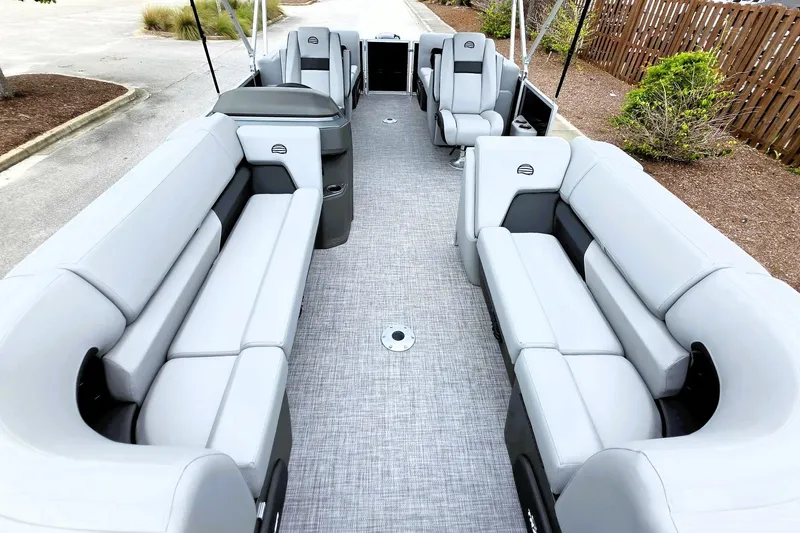 Slide: The Image of 2027 Sun Tracker Party Barge 22 DLX interior with spacious seating and modern design. - 14
