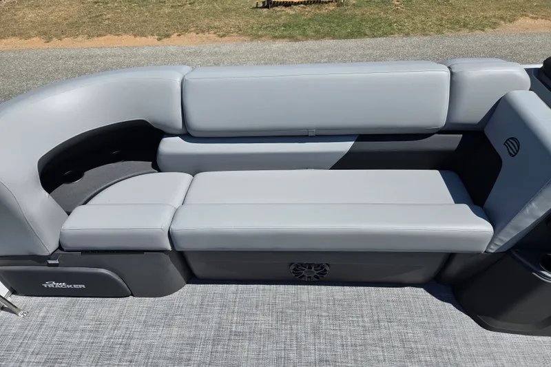 Slide: The Image of 2027 Sun Tracker Party Barge 20 DLX pontoon boat seating, featuring sleek gray upholstery. - 13