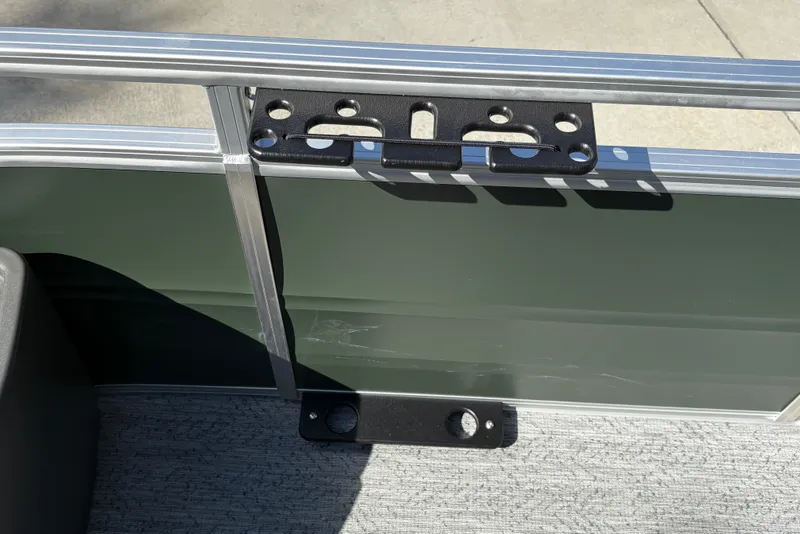 Slide: The Image of 2027 Sun Tracker Fishin' Barge 22 DLX railing and bracket detail in sunlight. - 24