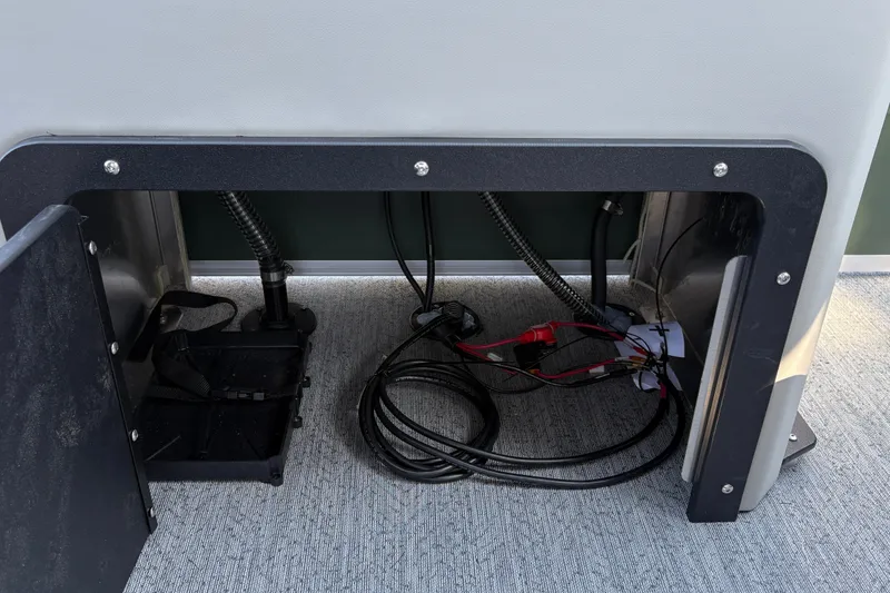 Slide: The Image of Interior wiring and components of a 2027 Sun Tracker Fishin' Barge 22 DLX boat. - 36