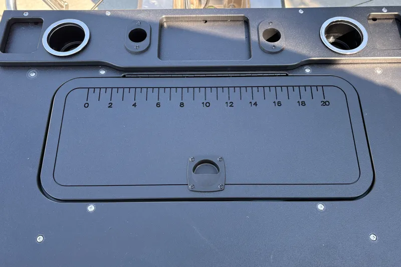 Slide: The Image of 2027 Sun Tracker Fishin' Barge 22 DLX deck with built-in measuring ruler. - 38