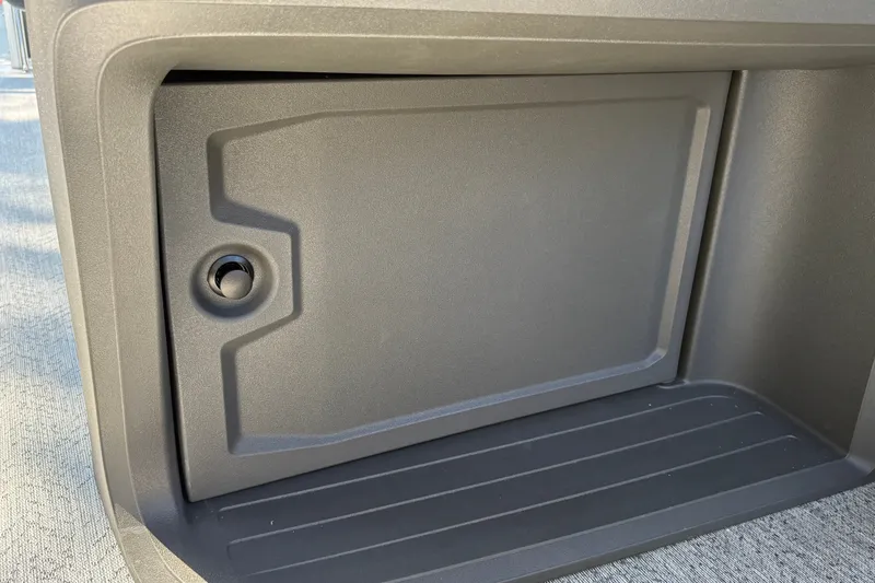 Slide: The Image of Storage compartment on 2027 Sun Tracker Fishin' Barge 22 DLX pontoon boat. - 43