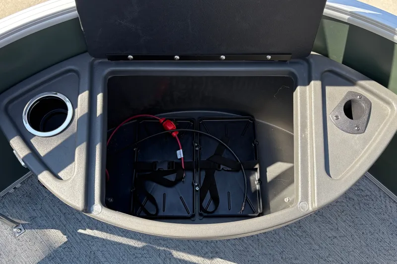 Slide: The Image of Open storage compartment on 2027 Sun Tracker Fishin' Barge 22 DLX boat. - 37