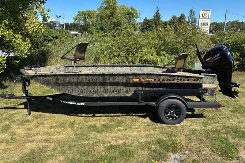 The Image of 2027 Tracker Grizzly 1756 T Marsh boat on trailer, camo design, Mercury engine. - 0