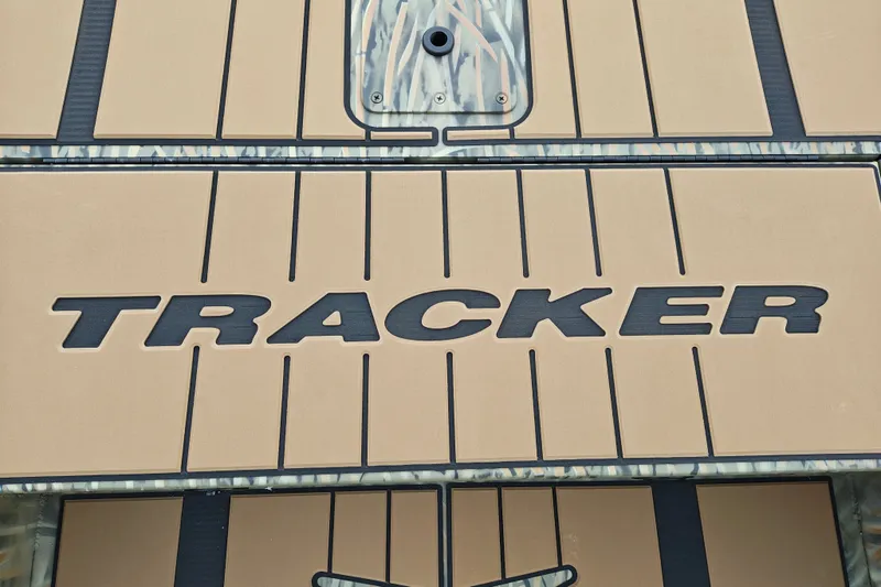 Slide: The Image of 2027 Tracker Grizzly 1756 T Marsh boat deck with logo and camouflage design. - 14