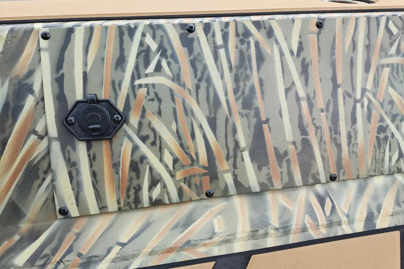 Slide: The Image of Camouflage pattern on 2027 Tracker Grizzly 1756 T Marsh boat with fuel cap detail. - 15