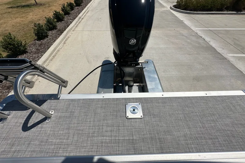 Slide: The Image of 2027 Sun Tracker Party Barge 20 DLX pontoon boat with motor and deck view. - 16