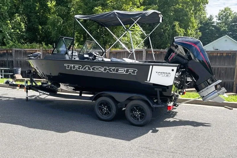 The Image of 2027 Tracker Targa V-18 WT boat on trailer, parked outdoors. - 0