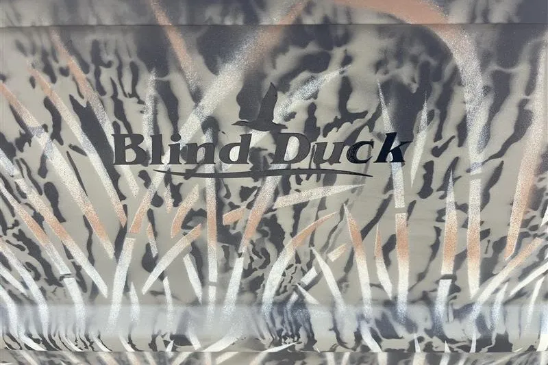 Slide: The Image of Camouflage pattern with "Blind Duck" text on Tracker Grizzly 1860 CC, 2027 model. - 13
