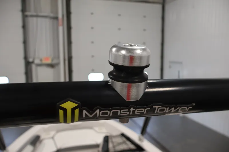 Slide: The Image of Monster Tower accessory on 2019 Scarab 165 G boat in indoor setting. - 26