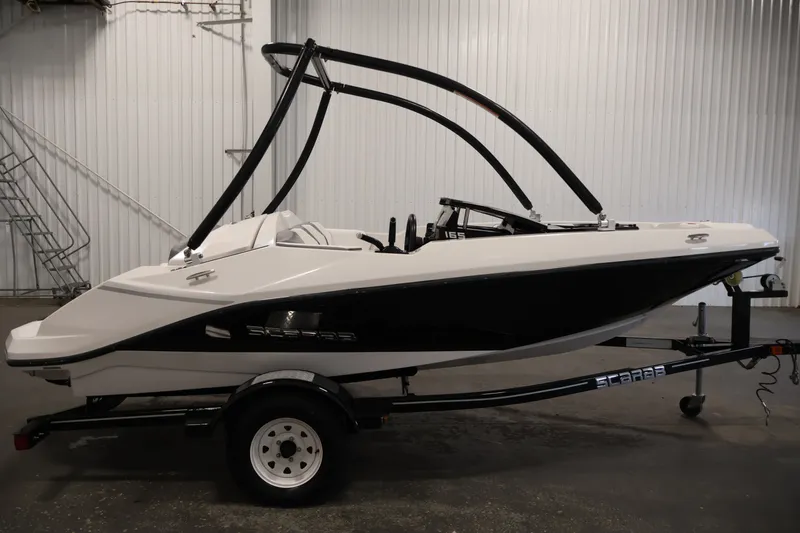 Slide: The Image of 2019 Scarab 165 G boat on trailer in indoor storage facility. - 3