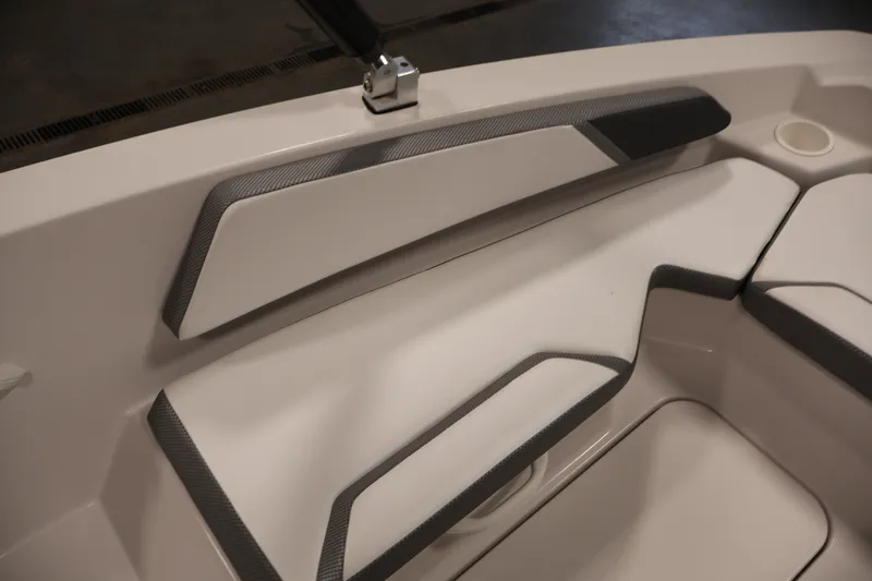 Slide: The Image of Interior seating of 2019 Scarab 165 G boat with sleek design and modern accents. - 12