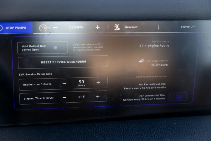 Slide: The Image of Dashboard of 2026 Nautique Super Air Nautique G25 Paragon showing service reminders. - 17
