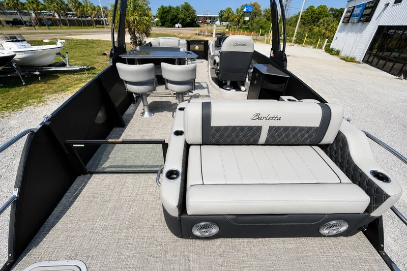 Slide: The Image of 2026 Barletta Lusso 25UE pontoon boat interior with luxurious seating and modern design. - 36