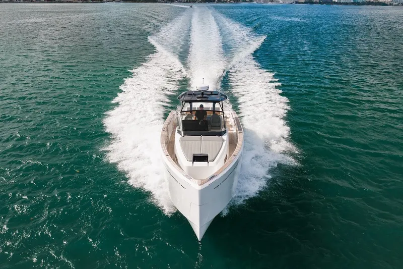Slide: The Image of 2021 Pardo Yachts P38 cruising on open water, showcasing sleek design and powerful performance. - 21