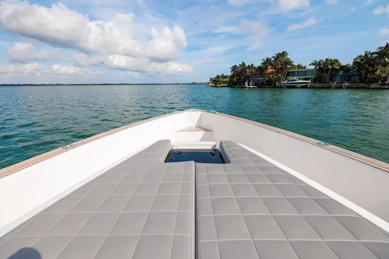 Slide: The Image of Bow view of 2021 Pardo Yachts P38, featuring sleek design and waterfront scenery. - 48