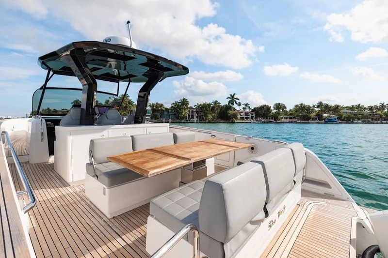 Slide: The Image of Luxury Pardo Yachts P38, 2021 model, cruising on serene waters with elegant seating. - 43