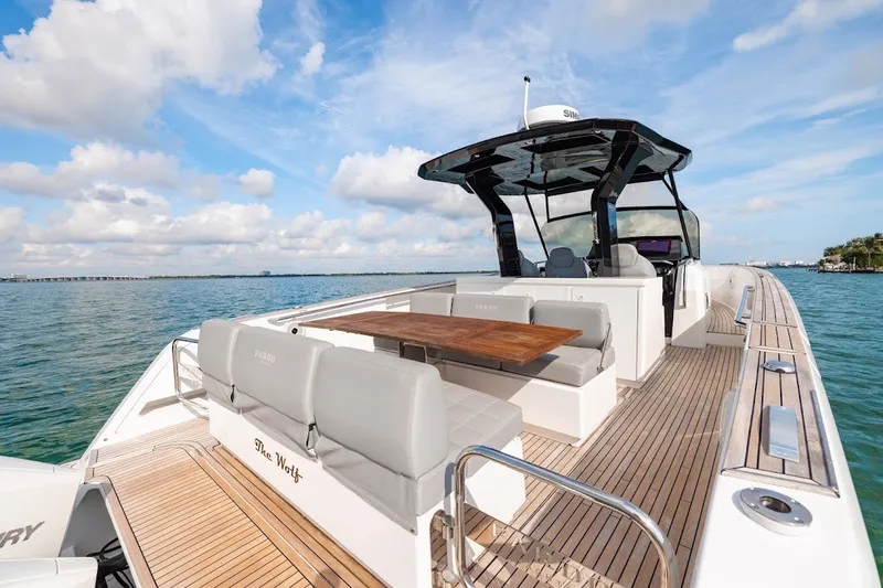 Slide: The Image of 2021 Pardo Yachts P38 luxury yacht with spacious deck and seating on open water. - 45