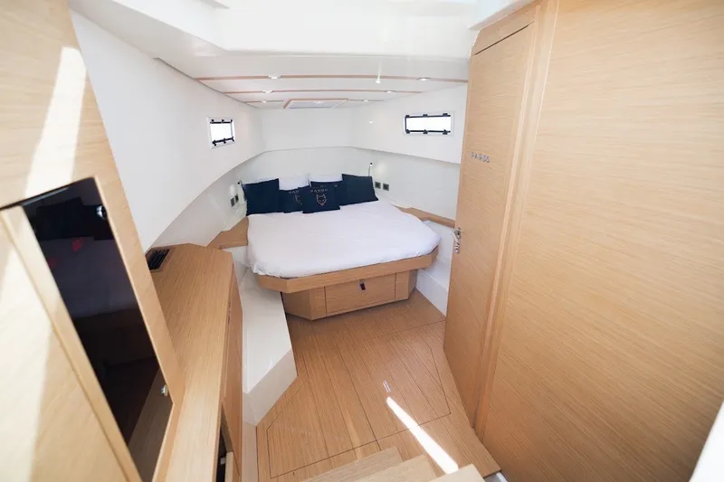 Slide: The Image of Luxurious cabin interior of 2021 Pardo Yachts P38, featuring a cozy bed and modern design. - 33