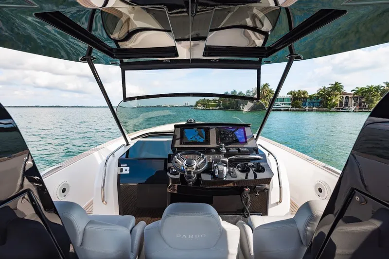 Slide: The Image of Cockpit view of 2021 Pardo Yachts P38 on a scenic waterway. - 23