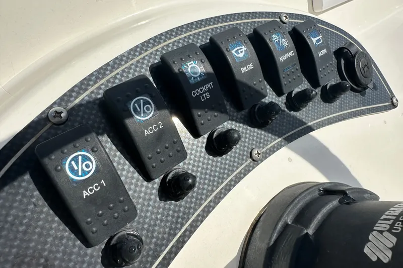 Slide: The Image of Control panel of a 2021 Savannah SS21 boat with labeled switches. - 17
