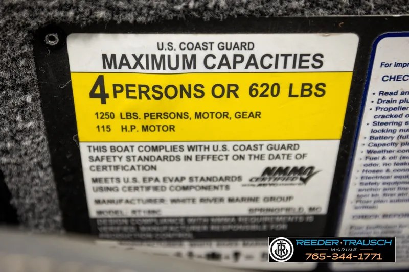 Slide: The Image of 2021 Ranger RT188C boat capacity label, 4 persons or 620 lbs, U.S. Coast Guard compliant. - 58