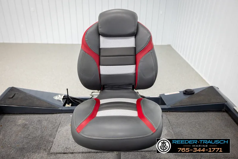 Slide: The Image of 2021 Ranger RT188C boat seat with gray and red accents in showroom. - 38
