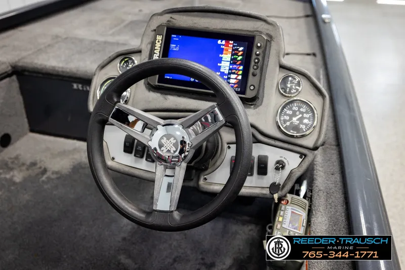 Slide: The Image of 2021 Ranger RT188C boat dashboard with steering wheel and electronic display. - 27