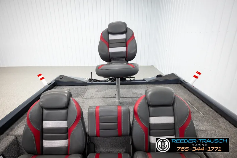 Slide: The Image of 2021 Ranger RT188C boat interior with gray and red seating, displayed at Reeder Trausch Marine. - 16