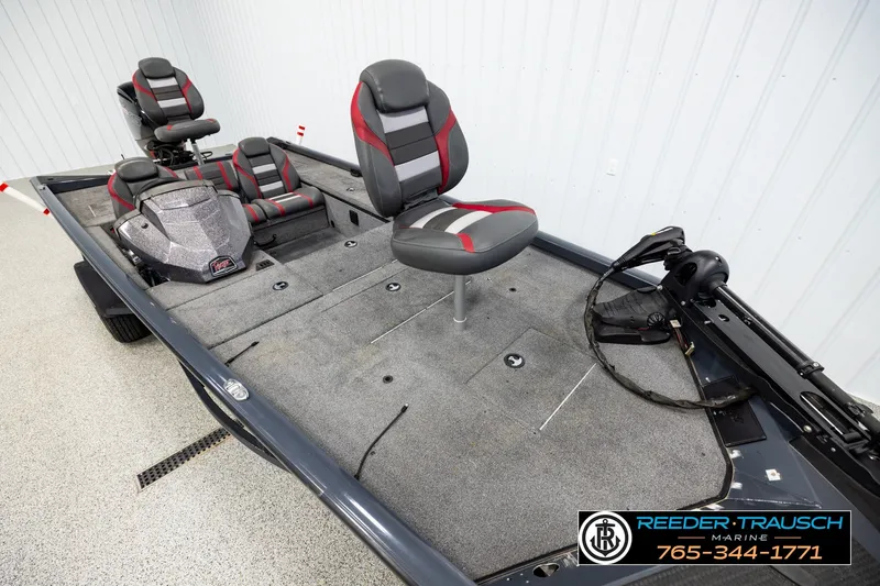 Slide: The Image of 2021 Ranger RT188C fishing boat interior with seating and trolling motor. - 7