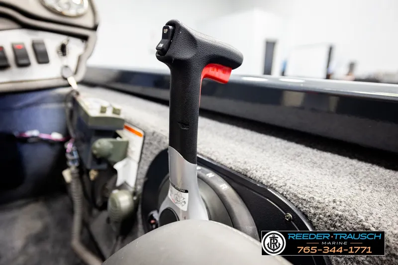 Slide: The Image of Throttle control in a 2021 Ranger RT188C boat cockpit, featuring detailed dashboard elements. - 36