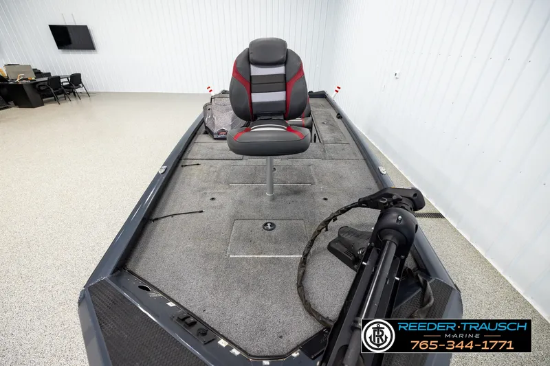 Slide: The Image of 2021 Ranger RT188C fishing boat interior with seating and equipment in showroom. - 14