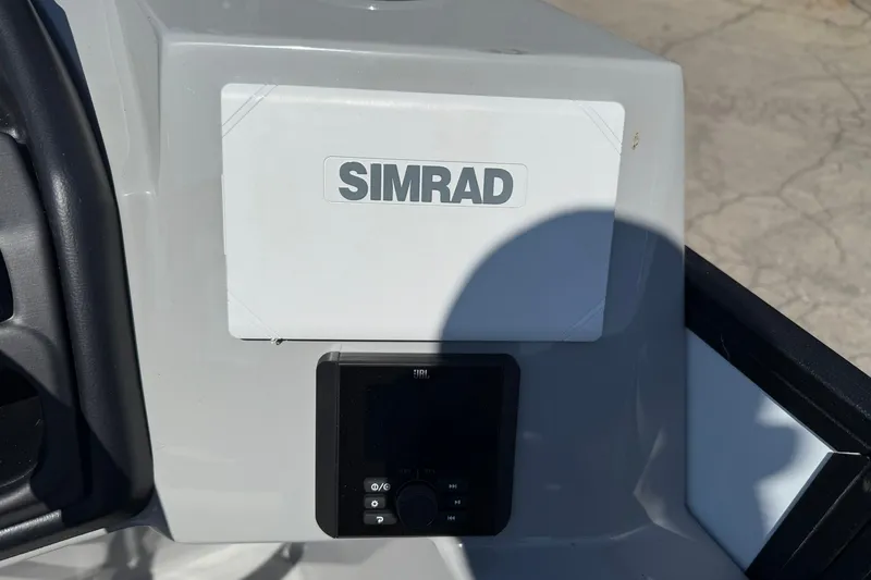 Slide: The Image of Control panel of 2026 Bentley Pontoons Legacy 223 Swingback with Simrad display. - 6