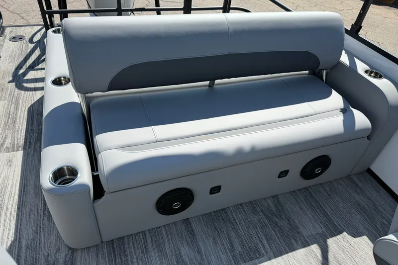 Slide: The Image of 2026 Bentley Pontoons Legacy 223 Swingback seating with cup holders and speaker system. - 16
