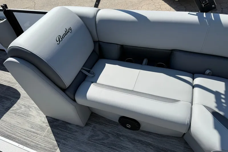 Slide: The Image of 2026 Bentley Pontoons Legacy 223 Swingback, featuring luxurious gray seating and elegant design. - 7