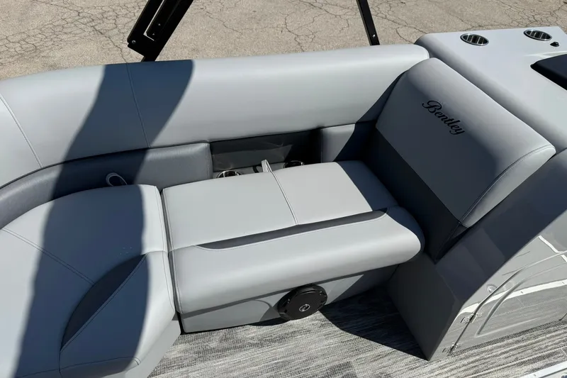 Slide: The Image of 2026 Bentley Pontoons Legacy 223 Swingback with luxurious gray seating and sleek design. - 9