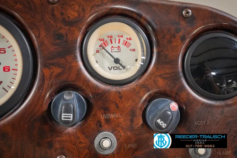 Slide: The Image of Dashboard of a 2000 Bennington 227L boat with voltmeter and controls. - 39