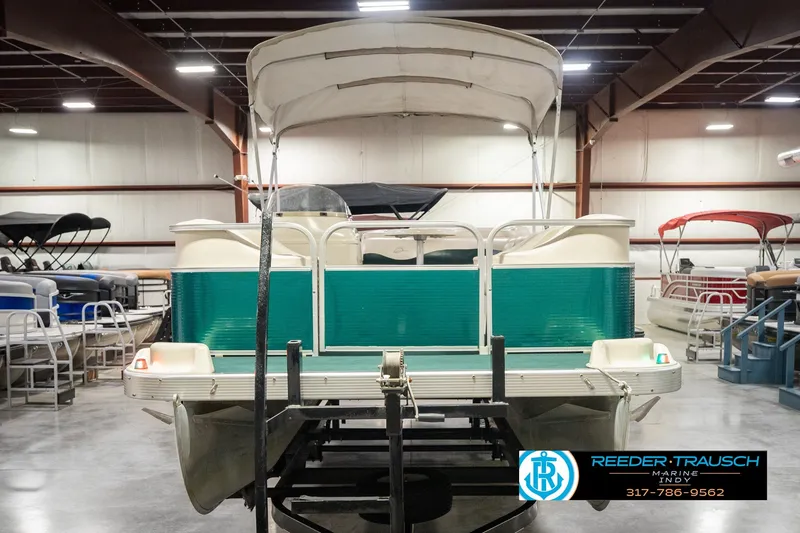 Slide: The Image of Bennington 227L 2000 pontoon boat in indoor storage facility. - 4